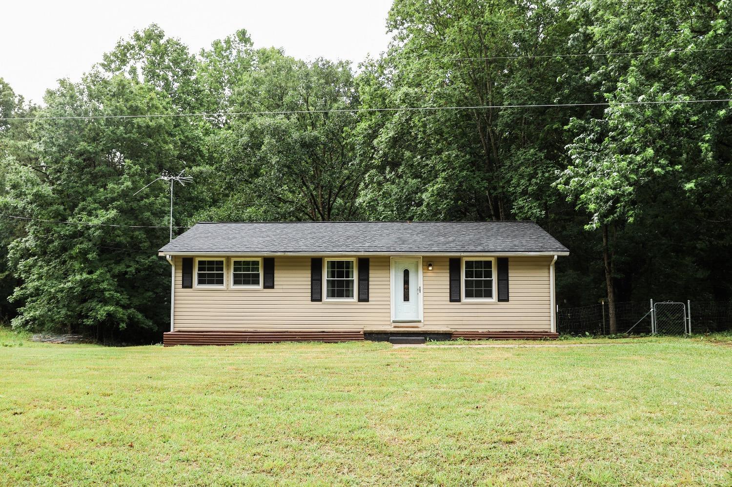 483 Pauls Road Rustburg, VA 24588 - Photo 2 of 21 a front view of a house with a garden