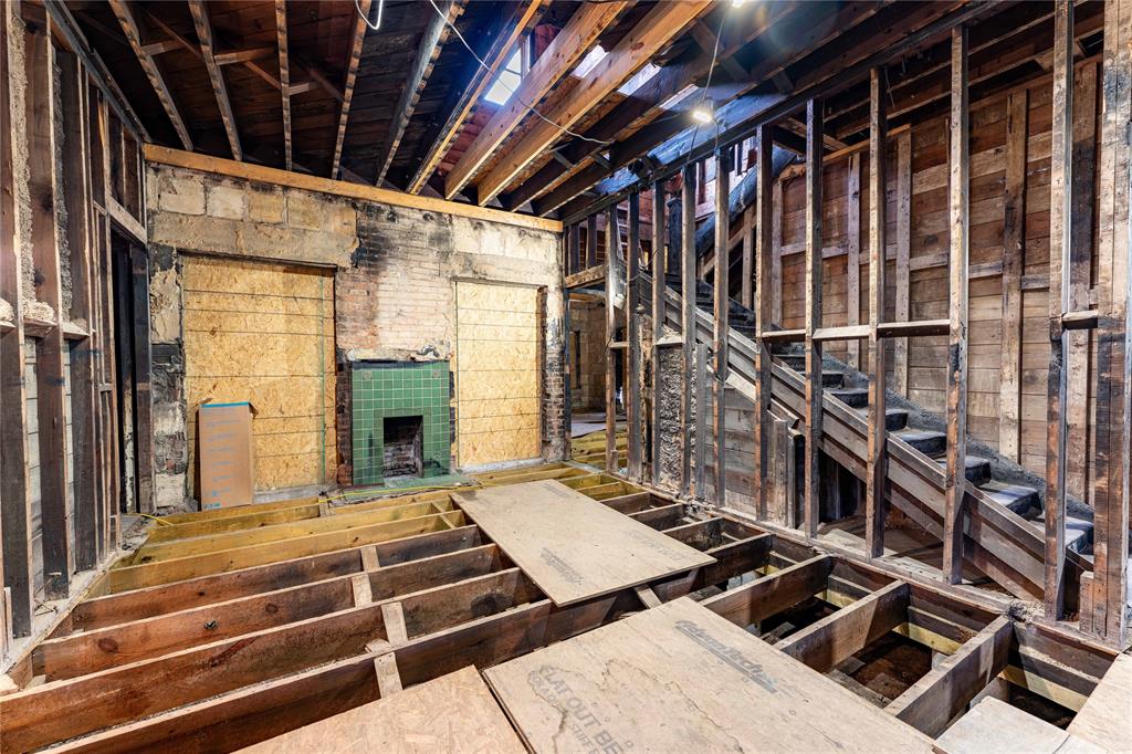 621 South Main Street Paris, TX 75460 - Photo 9 of 30 a view of a patio with table and chairs with wooden floor and fence