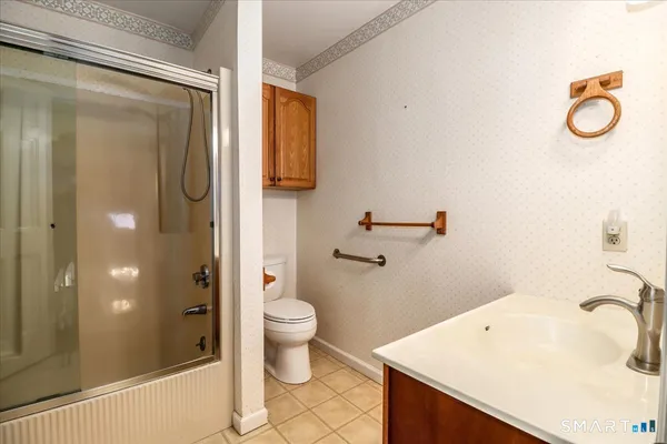 a picture of a room with a bench