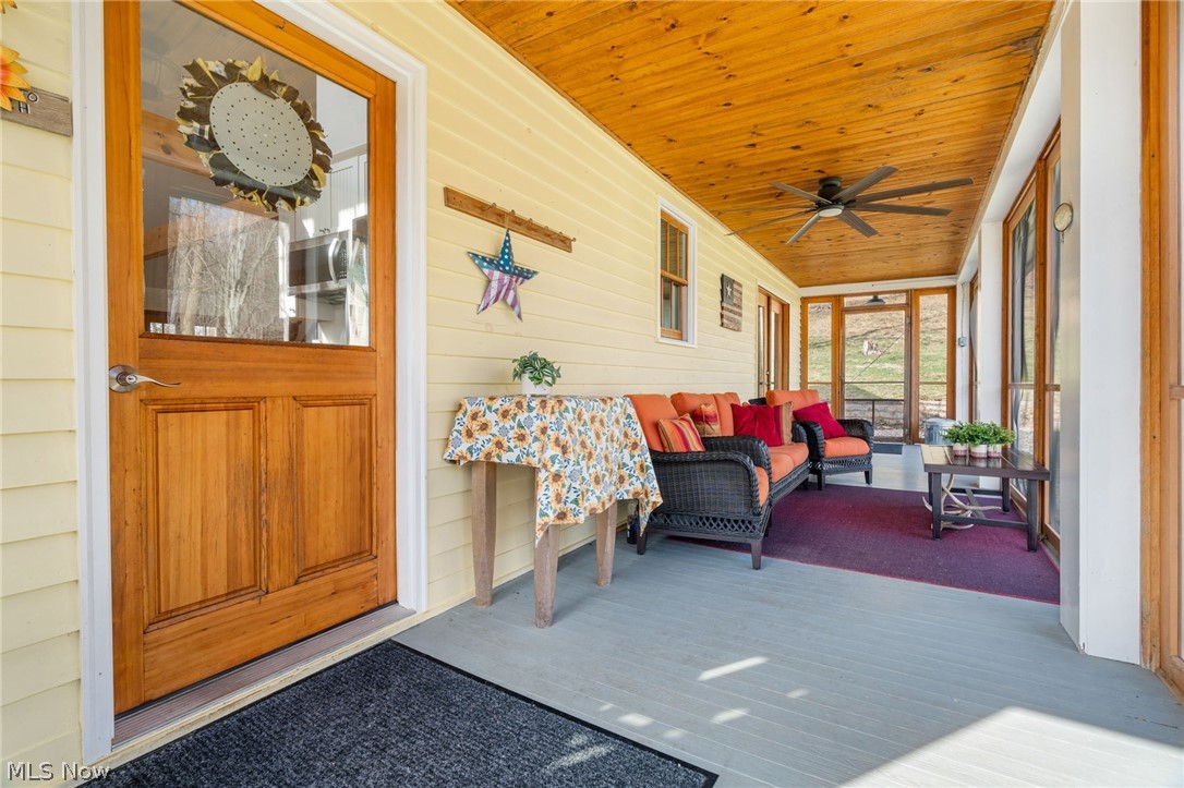 2210 Scroll Road Southwest Carrollton, OH 44615 - Photo 23 of 48 Screened in seasonal porch