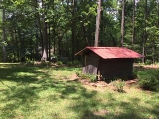 340 Holloman Road Gray, GA 31032 - Photo 9 of 22 a backyard of a house with table and chairs