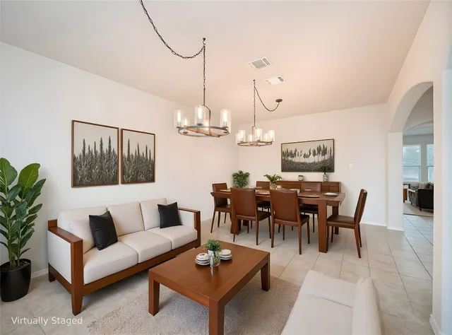 a view of a dining room with furniture