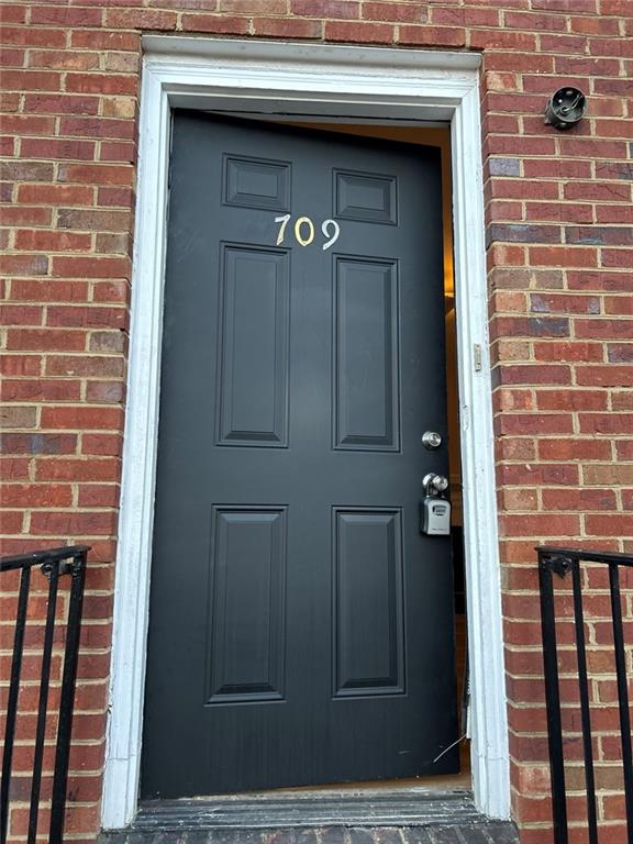 1166 Booth Road Southwest, Unit 709 Marietta, GA 30008 - Photo 2 of 12 a view of front door
