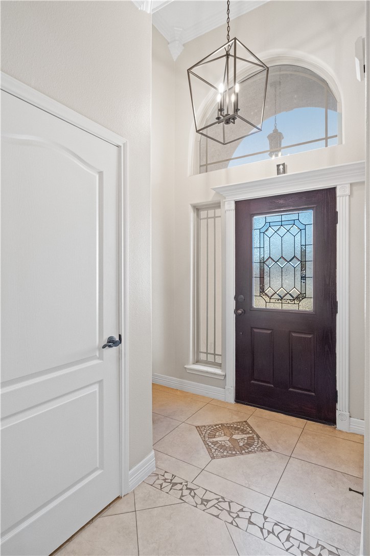 6934 Wooldridge Road, Unit K Corpus Christi, TX 78414 - Photo 4 of 20 a view of a hallway with windows and entryway