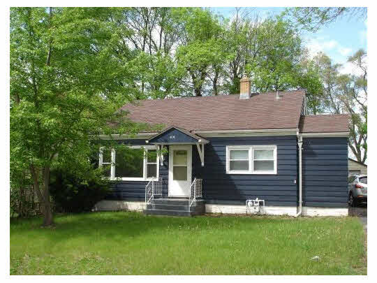 414 Fitch Road Rockford, IL 61109 - Photo 1 of 10 a view of a house with a yard potted plants and large tree