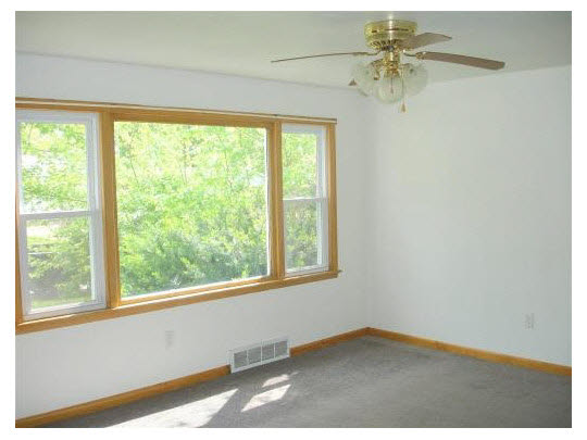 414 Fitch Road Rockford, IL 61109 - Photo 3 of 10 a view of an empty room with a window