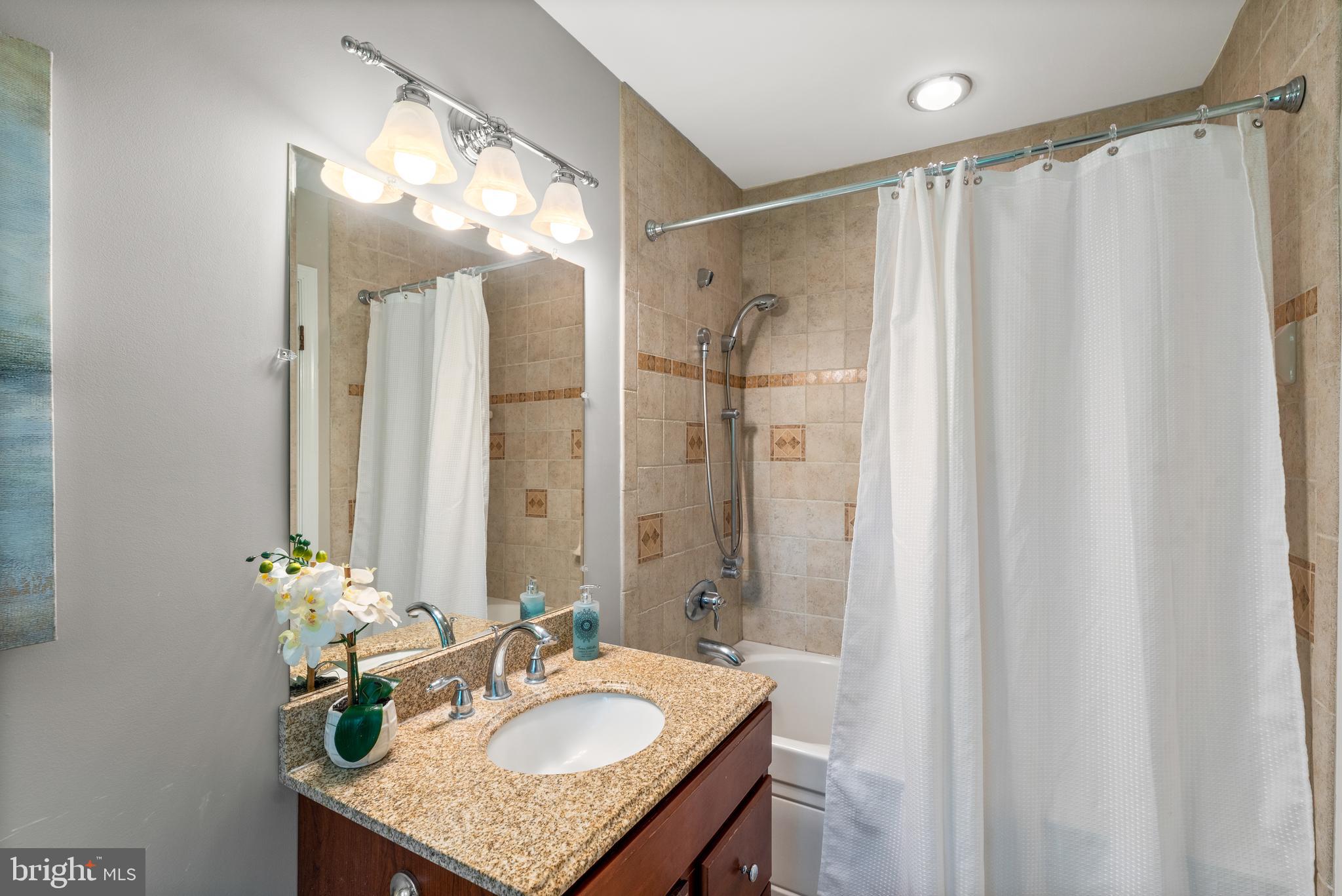 10711 Sandy Landing Road Potomac, MD 20854 - Photo 18 of 36 Primary Bath - Upper Level