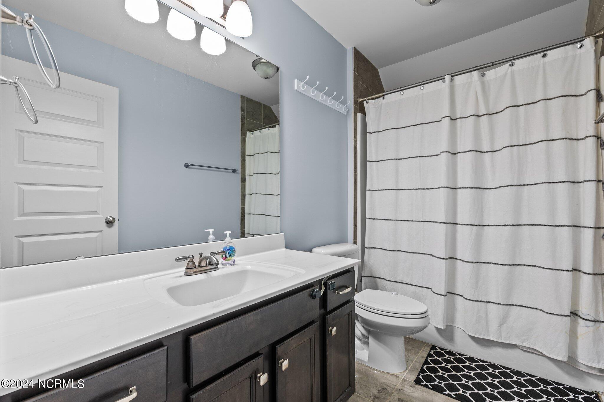 608 Sun Road Aberdeen, NC 28315 - Photo 19 of 27 Second Bathroom Upstairs