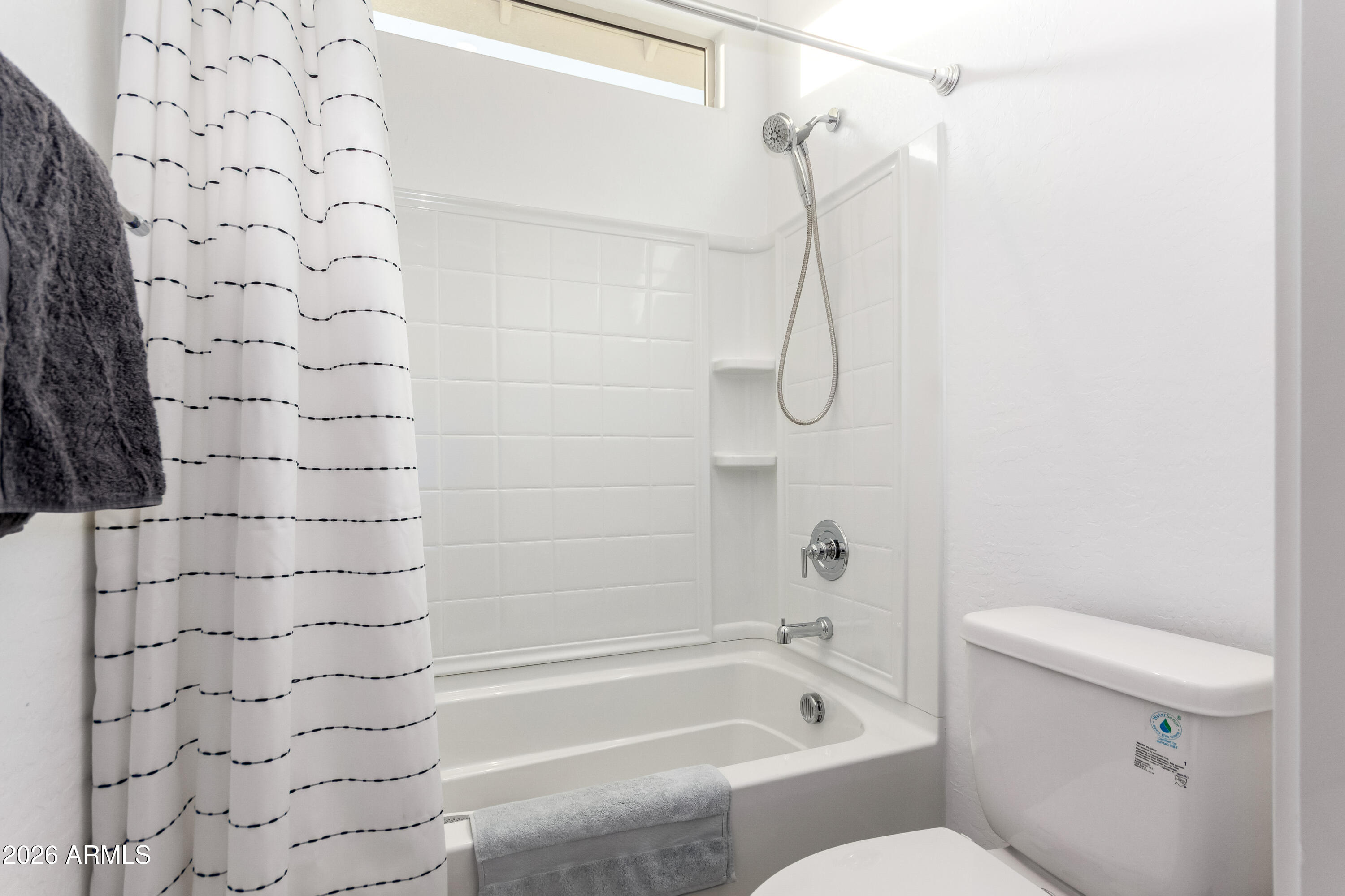 2034 West Sleepy Ranch Road Phoenix, AZ 85085 - Photo 17 of 35 a bathroom with a shower and a toilet