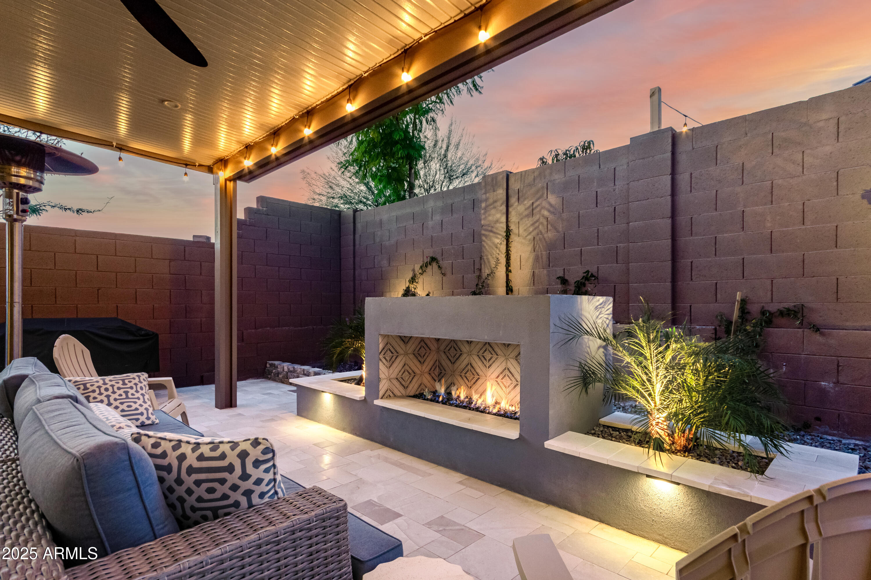 2034 West Sleepy Ranch Road Phoenix, AZ 85085 - Photo 24 of 35 a living room with furniture and a fireplace