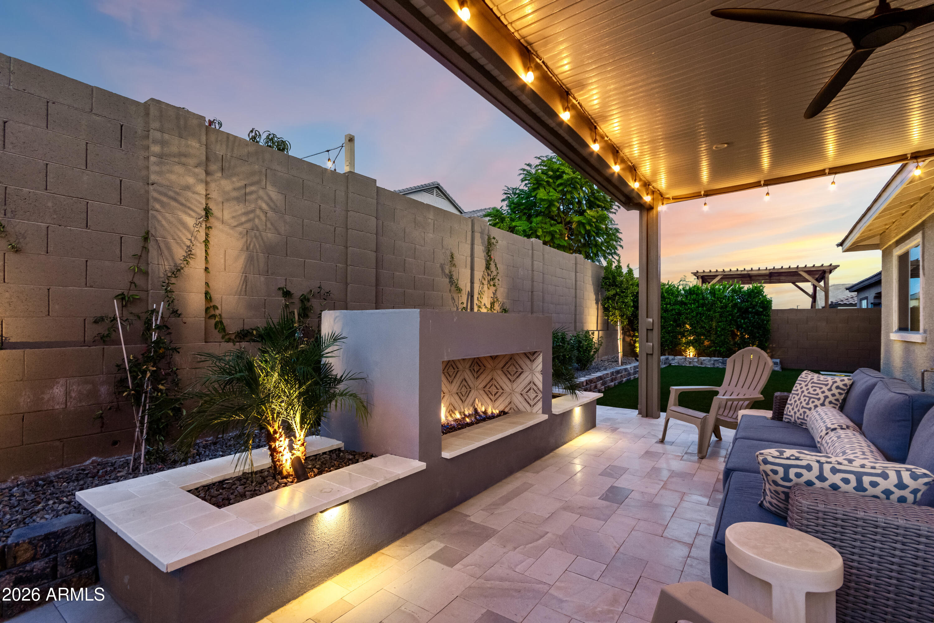 2034 West Sleepy Ranch Road Phoenix, AZ 85085 - Photo 27 of 35 a outdoor space with patio furniture and a fireplace