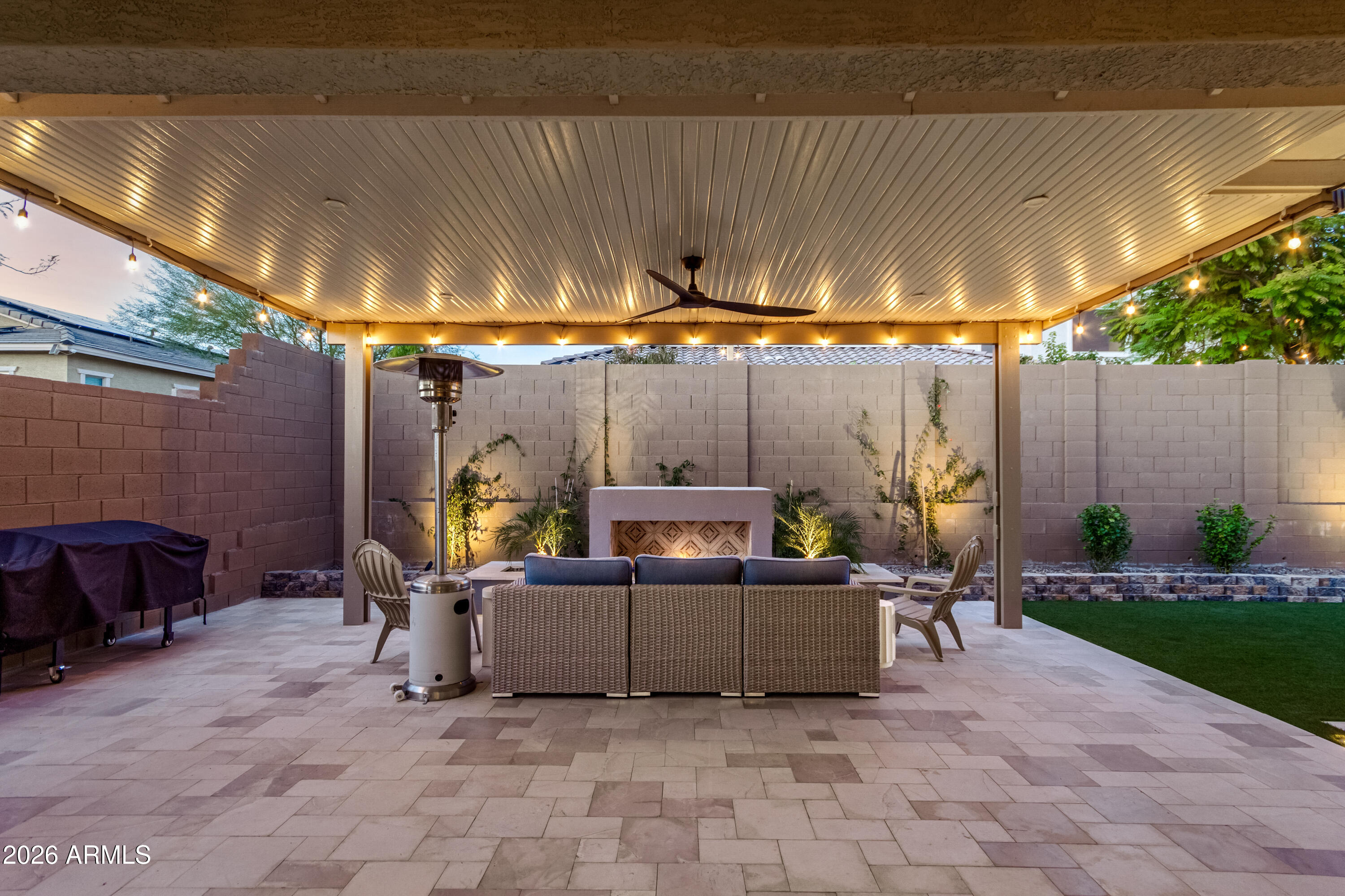 2034 West Sleepy Ranch Road Phoenix, AZ 85085 - Photo 3 of 35 a view of a patio with a table and chairs