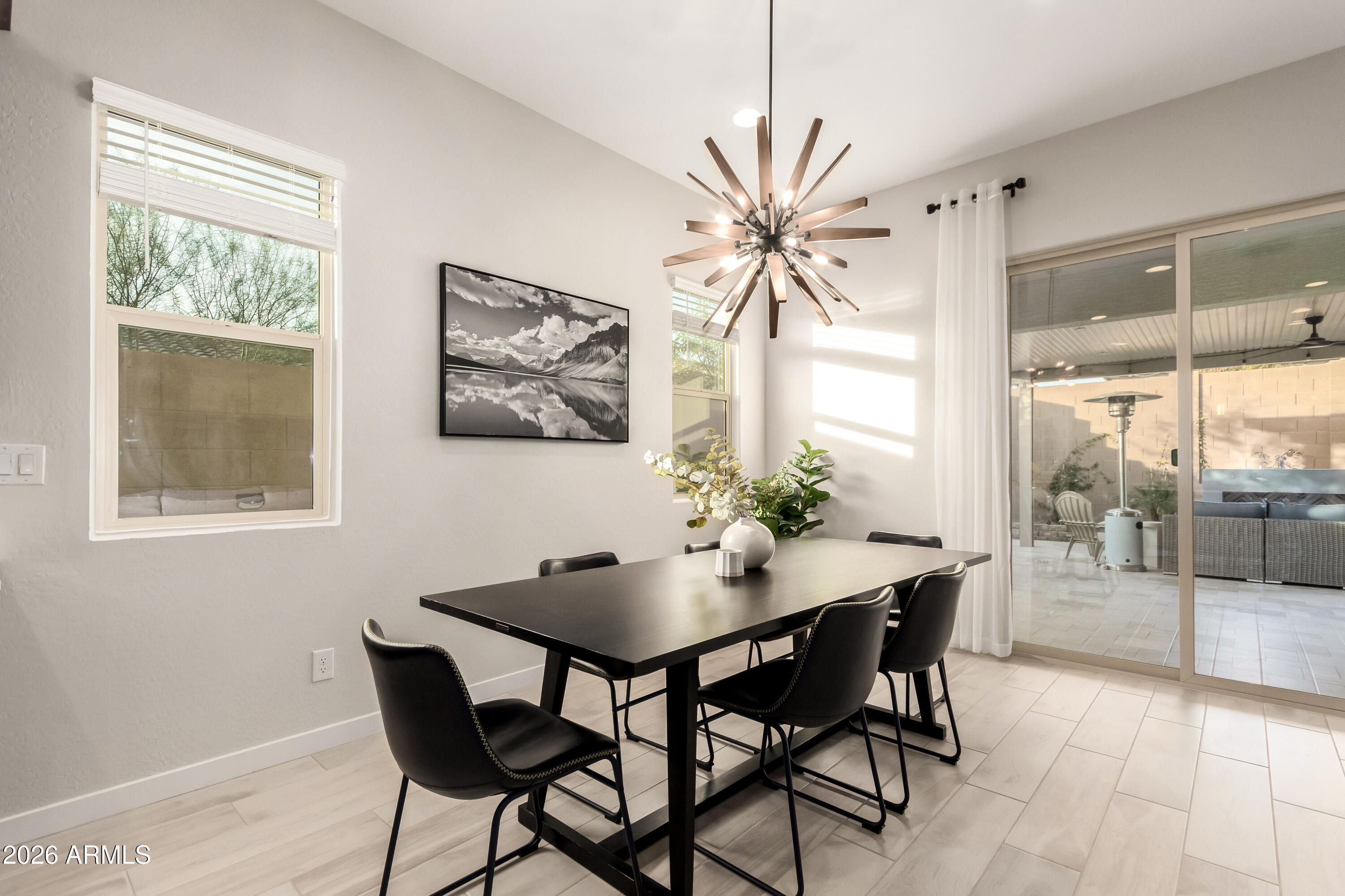 2034 West Sleepy Ranch Road Phoenix, AZ 85085 - Photo 9 of 35 a dining room with furniture and window