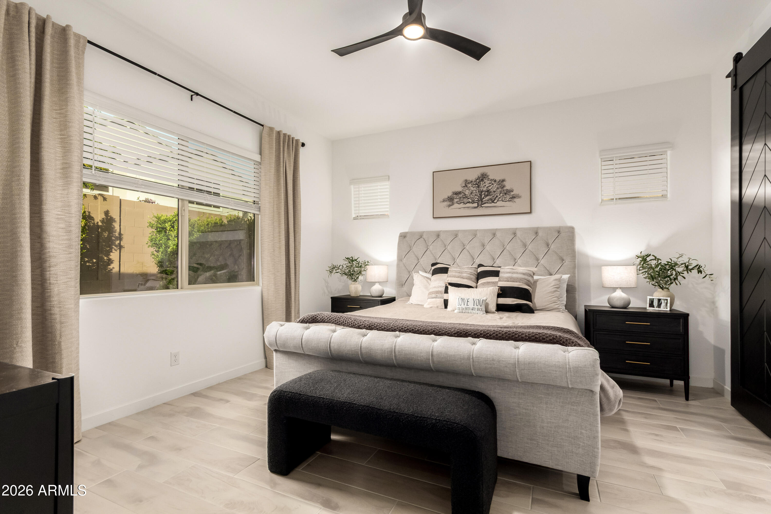 2034 West Sleepy Ranch Road Phoenix, AZ 85085 - Photo 10 of 35 a bedroom with a bed and a window