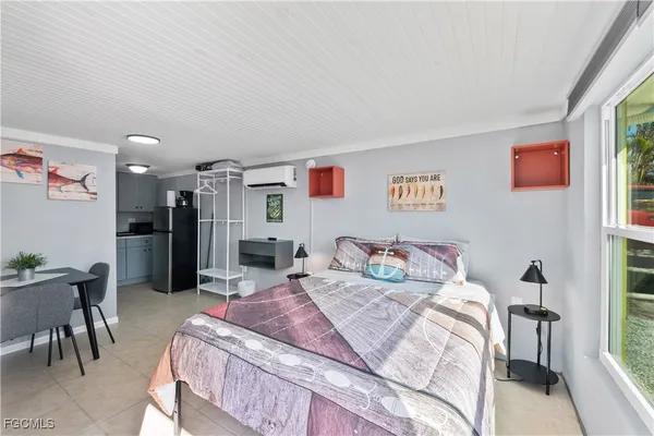 a bedroom with furniture and a bed