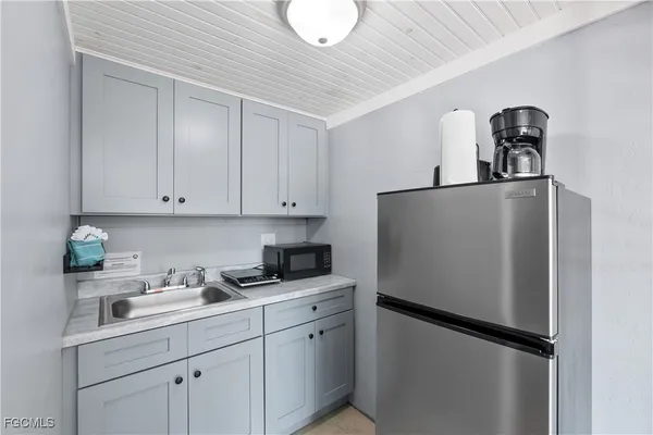 a bed room with a bed and furniture