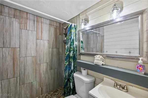 a bed room with a bed and a couch