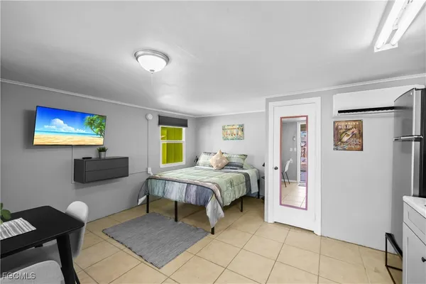 a bathroom with a sink and mirror with toilet