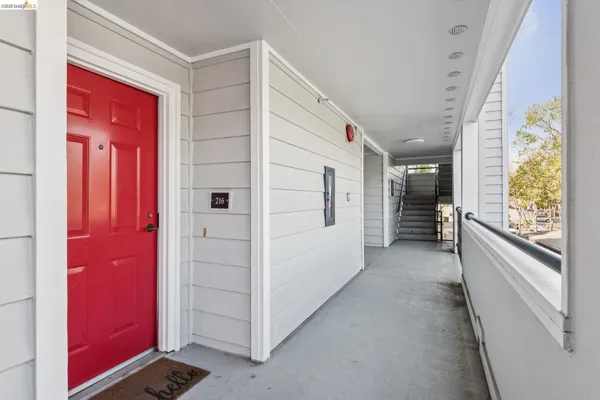 a view of hallway with windows