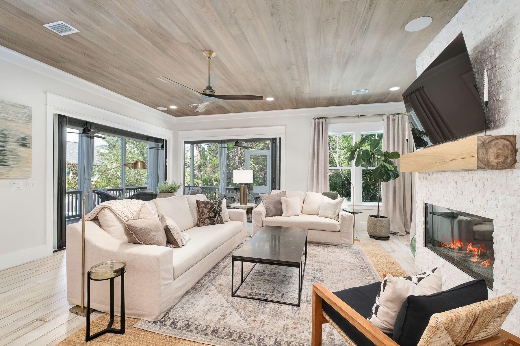 9 Bowline Alley Santa Rosa Beach, FL 32459 - Photo 15 of 52 a living room with furniture fireplace and a flat screen tv