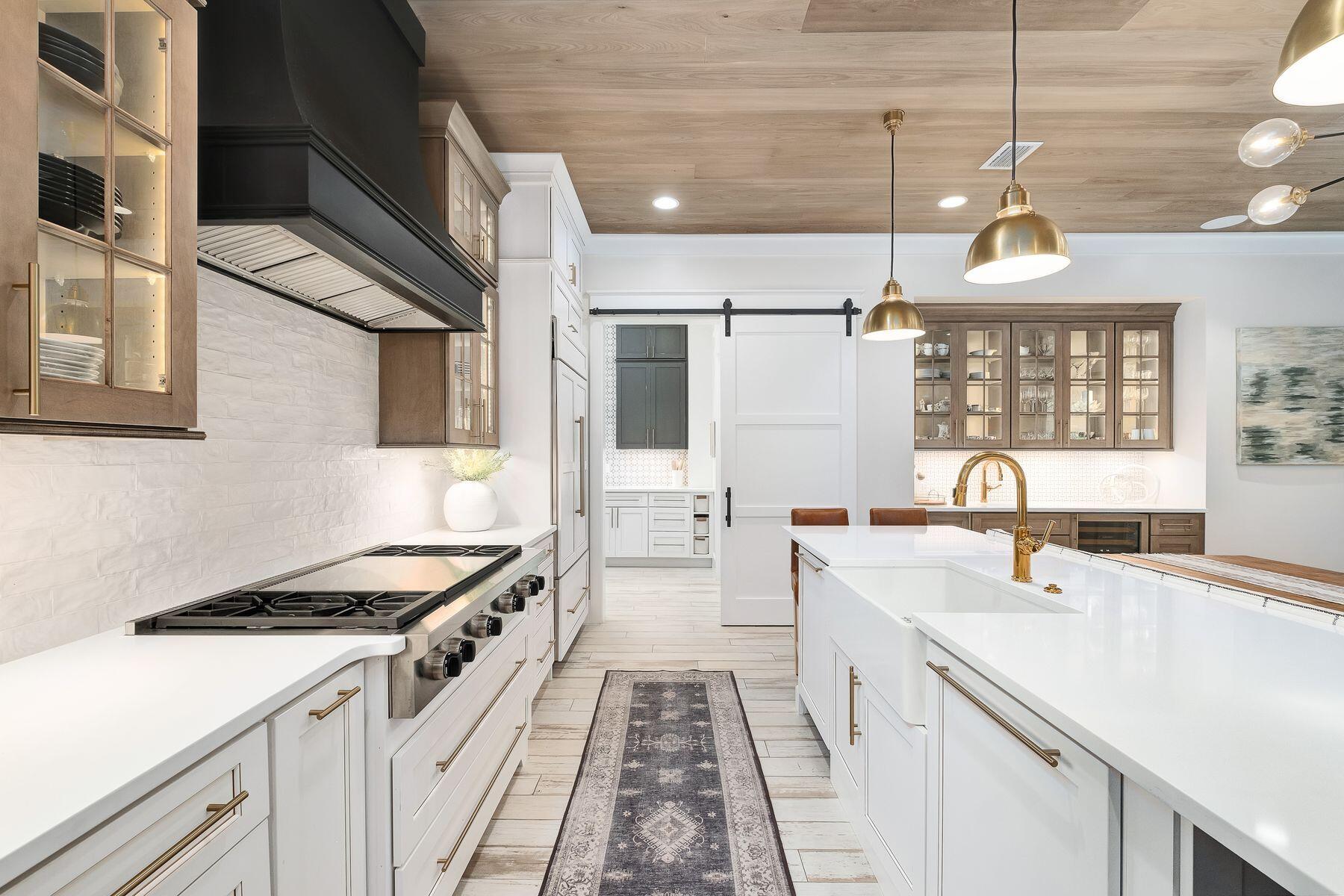 9 Bowline Alley Santa Rosa Beach, FL 32459 - Photo 19 of 52 a kitchen that has a lot of cabinets in it