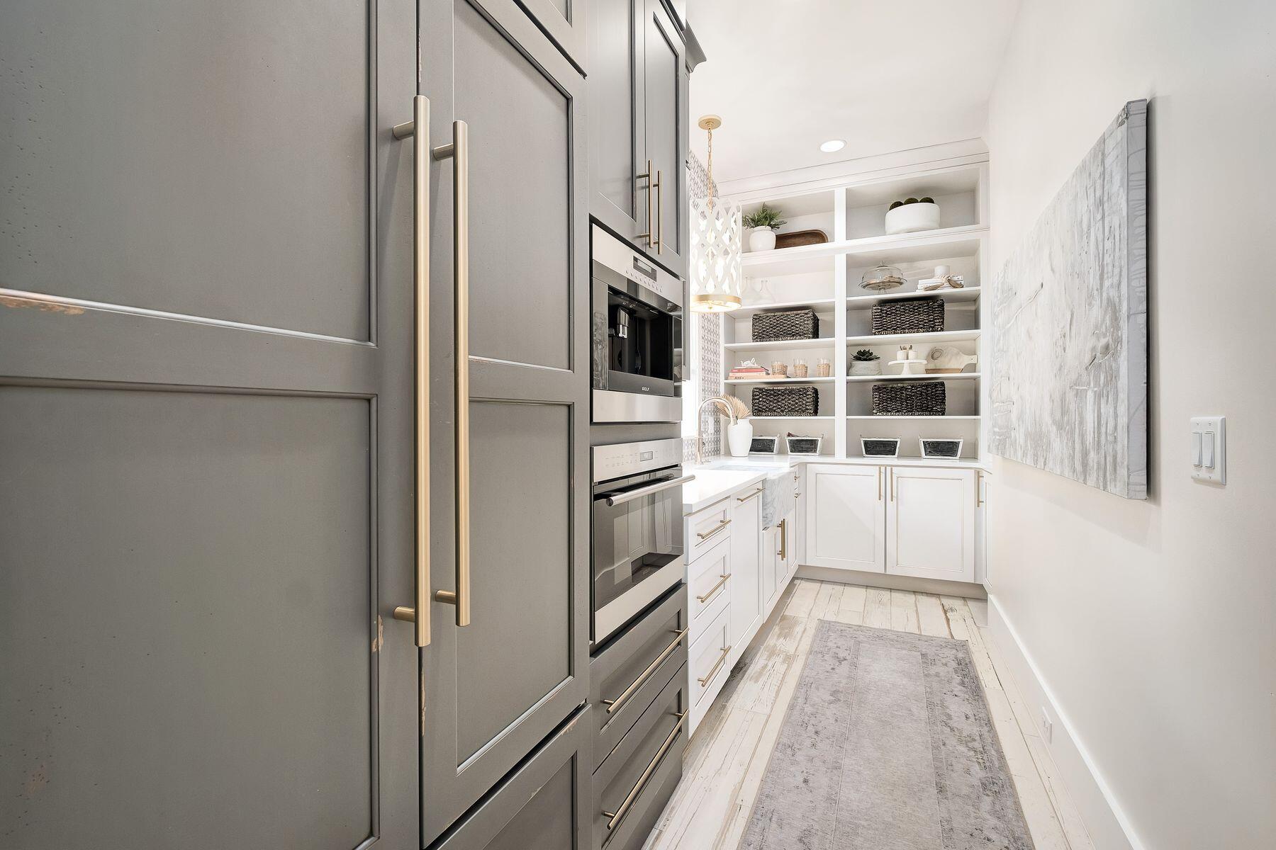 9 Bowline Alley Santa Rosa Beach, FL 32459 - Photo 21 of 52 a kitchen with stainless steel appliances a refrigerator and a stove top oven