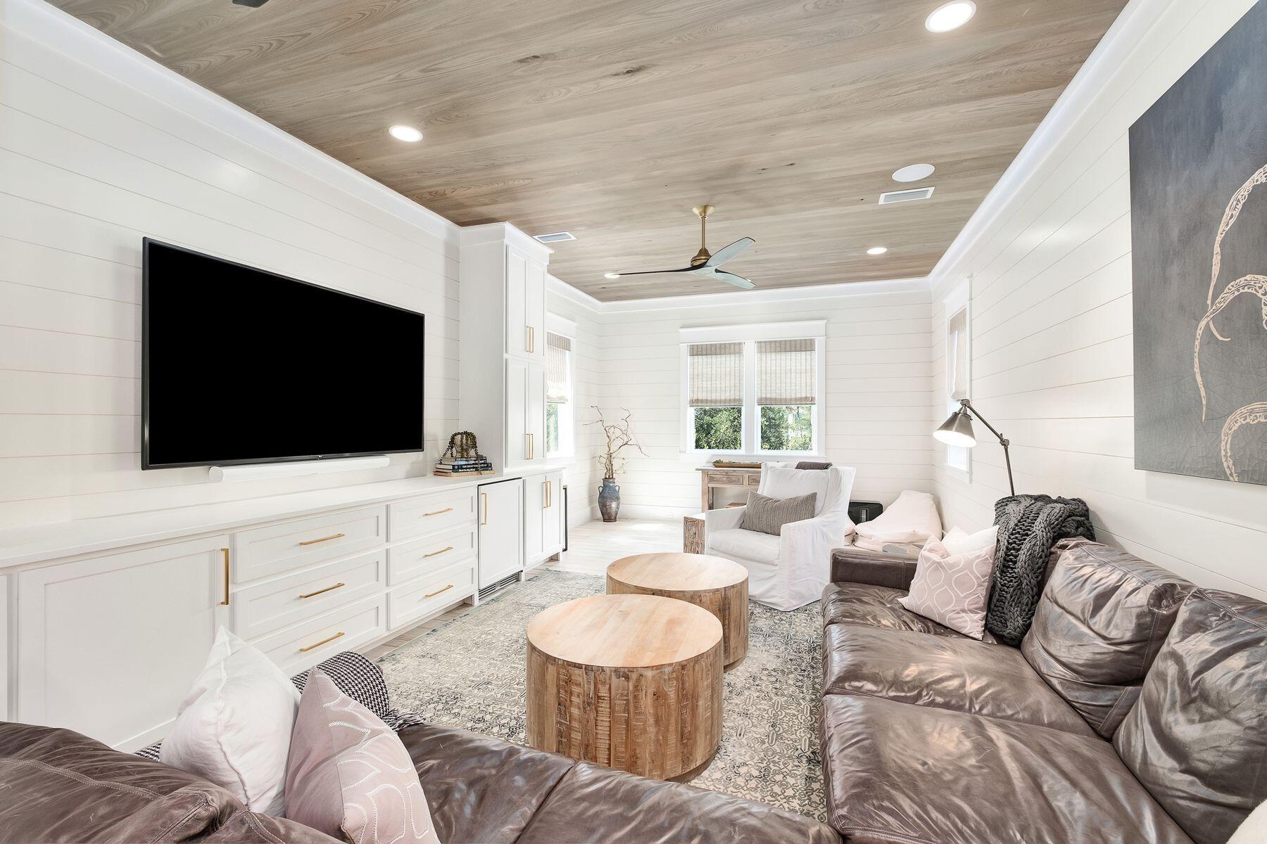 9 Bowline Alley Santa Rosa Beach, FL 32459 - Photo 30 of 52 a living room with furniture and a flat screen tv