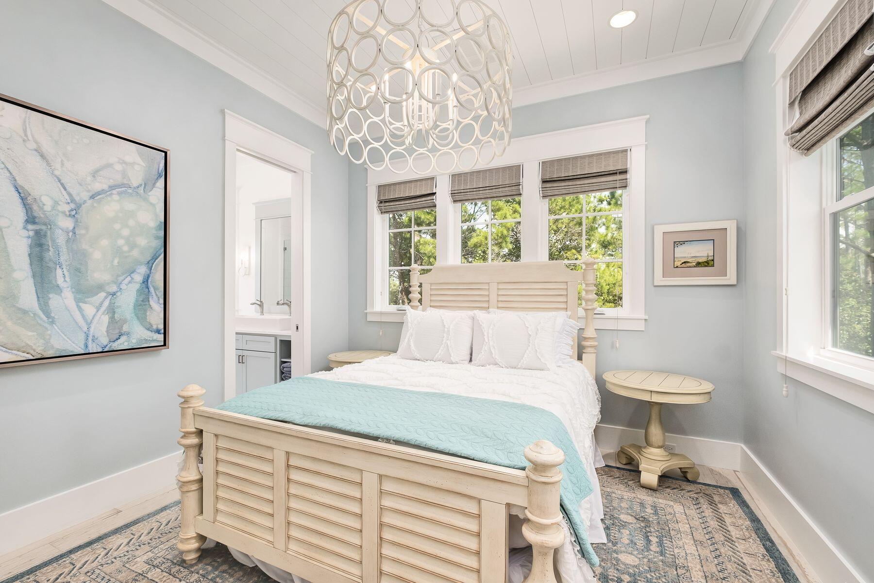 9 Bowline Alley Santa Rosa Beach, FL 32459 - Photo 35 of 52 a bedroom with a bed and a painting on the wall