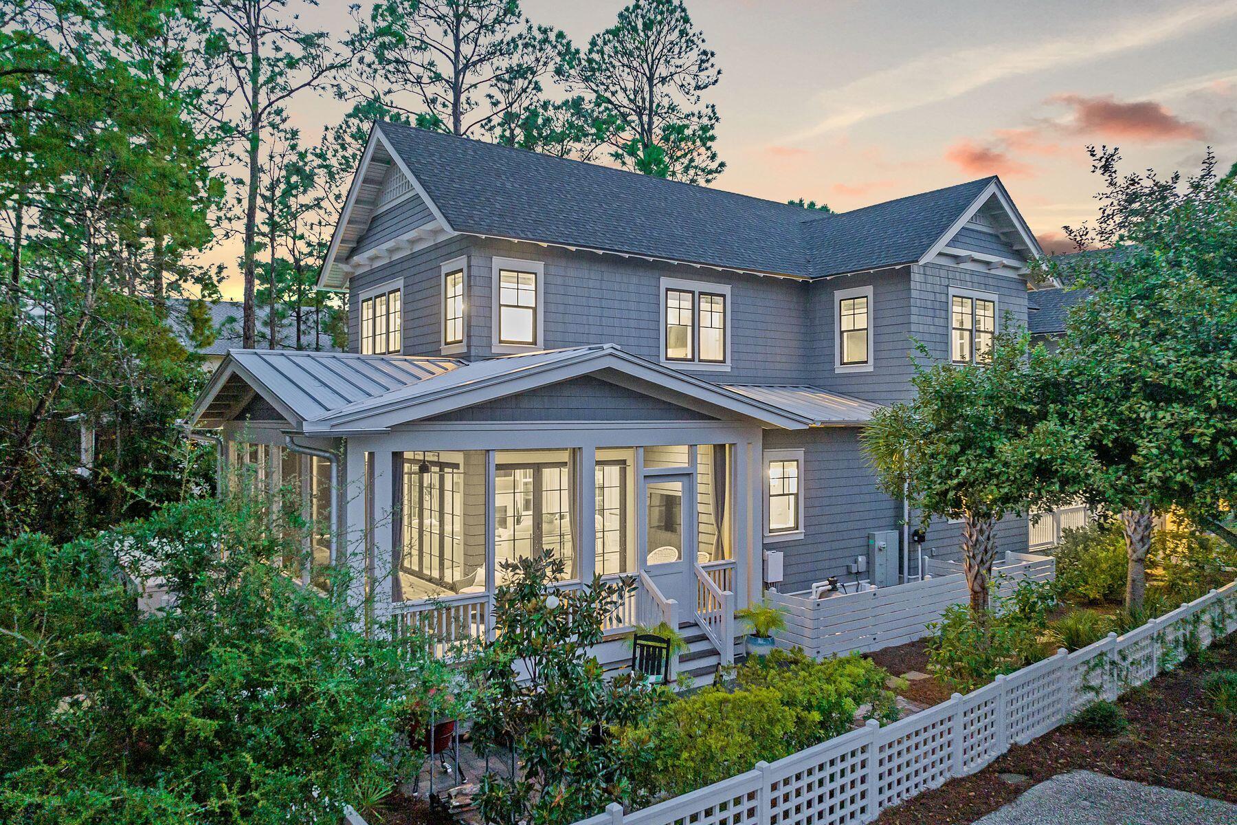9 Bowline Alley Santa Rosa Beach, FL 32459 - Photo 5 of 52 a front view of a house with a yard and outdoor seating