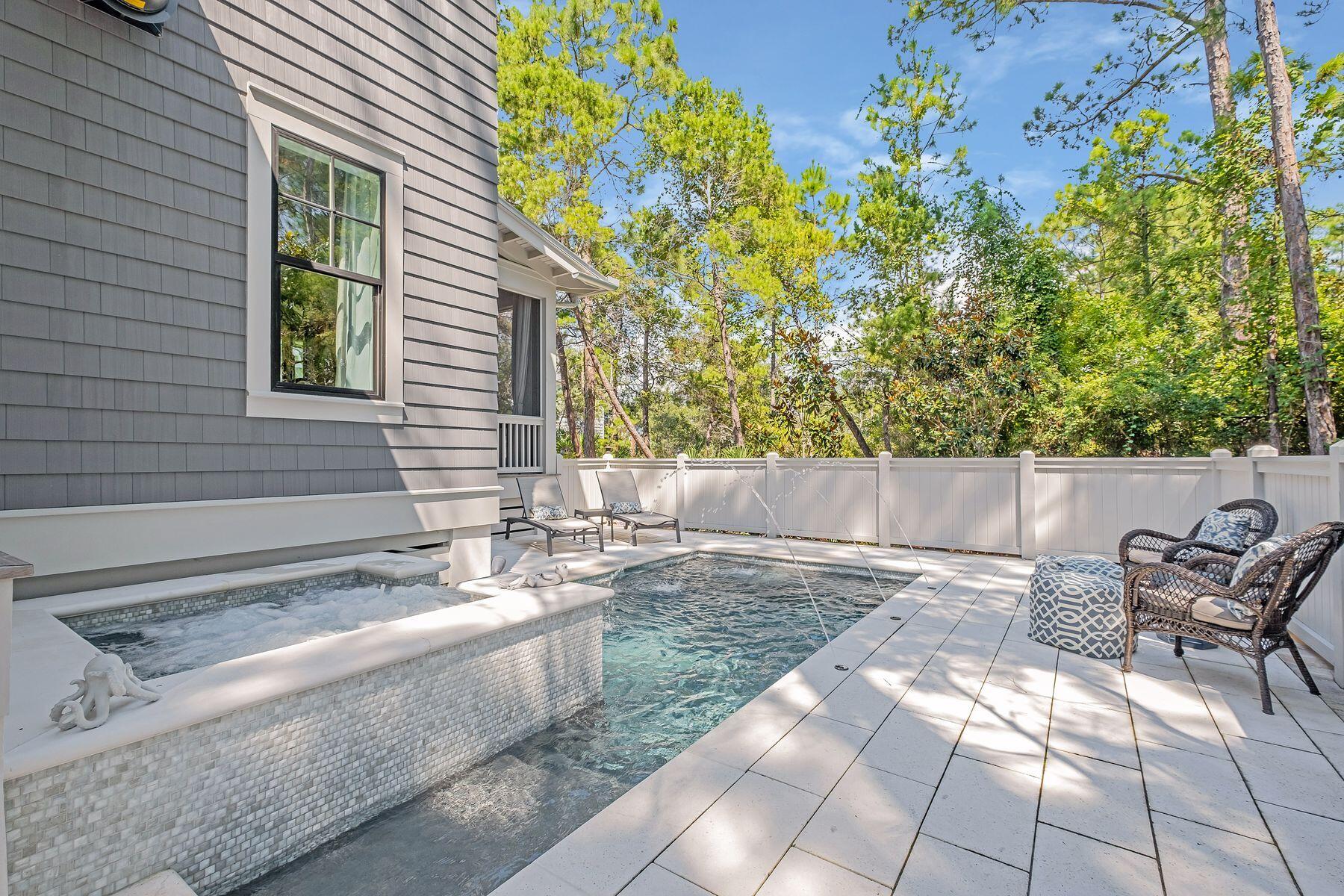 9 Bowline Alley Santa Rosa Beach, FL 32459 - Photo 6 of 52 a view of a backyard with chairs and potted plants