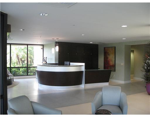 1800 South Ocean Boulevard, Unit 3C Boca Raton, FL 33432 - Photo 15 of 21 a living room with large window and furniture