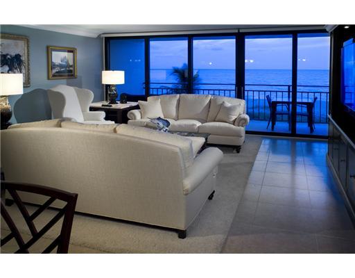 1800 South Ocean Boulevard, Unit 3C Boca Raton, FL 33432 - Photo 3 of 21 a living room with furniture and large windows