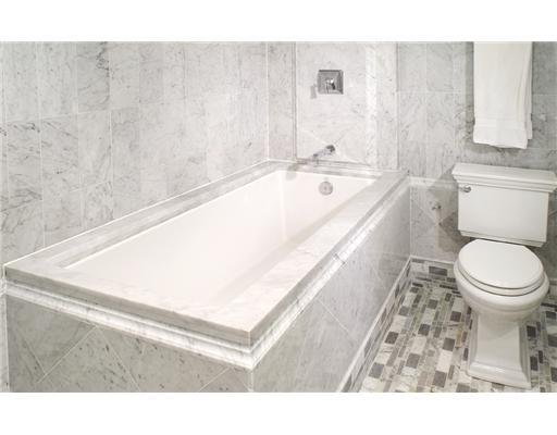 1800 South Ocean Boulevard, Unit 3C Boca Raton, FL 33432 - Photo 10 of 21 a bathroom with a toilet a sink and bathtub