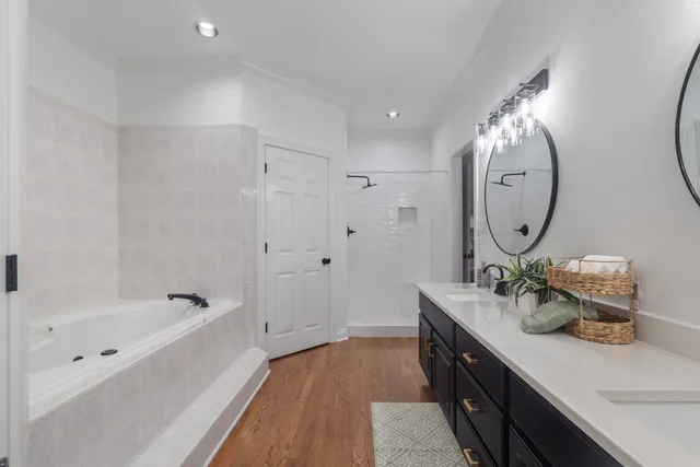 a view of bathroom and bathtub