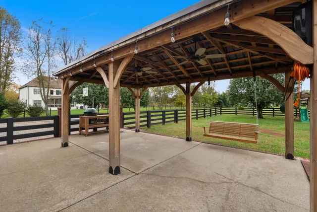 a view of a house with a big yard
