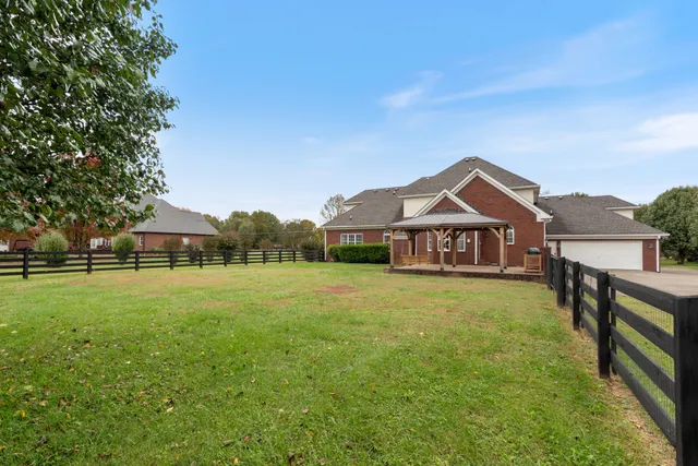 an aerial view of a house with a garden