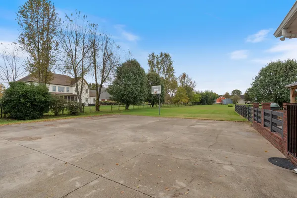 a view of a house with a big yard