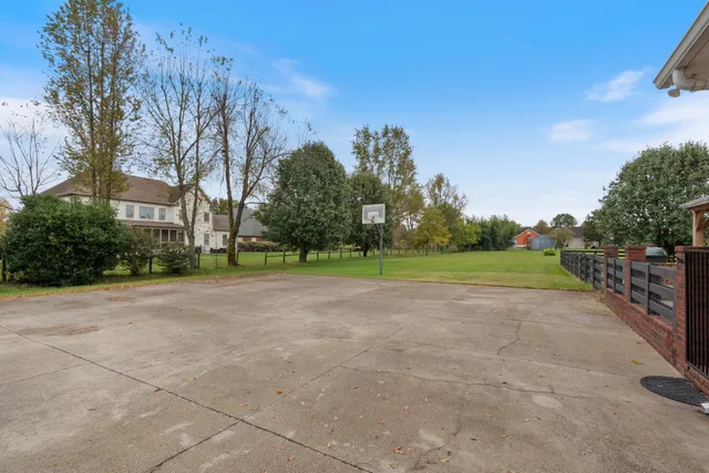 a view of a house with a big yard