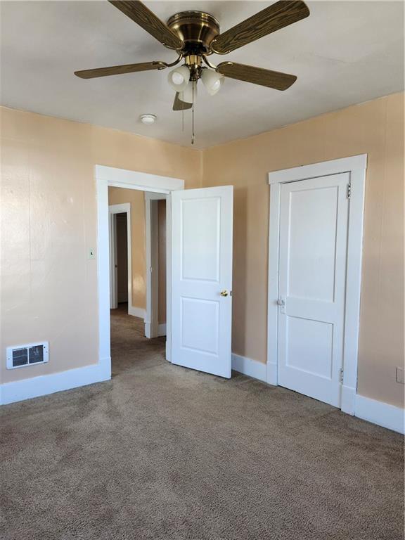 808 18th Street Ambridge, PA 15003 - Photo 19 of 49 a view of a big room with closet and chandelier fan