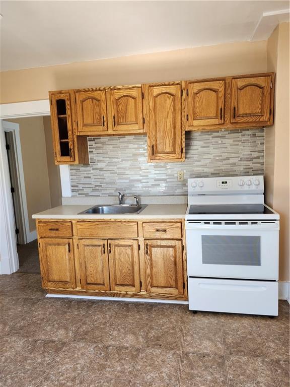 808 18th Street Ambridge, PA 15003 - Photo 25 of 49 a view of kitchen with granite countertop cabinets and stainless steel appliances