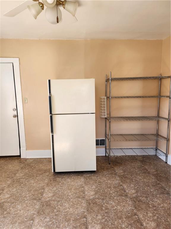 808 18th Street Ambridge, PA 15003 - Photo 26 of 49 a view of a room with wooden floor and a shelf