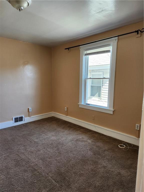808 18th Street Ambridge, PA 15003 - Photo 28 of 49 an empty room with a window