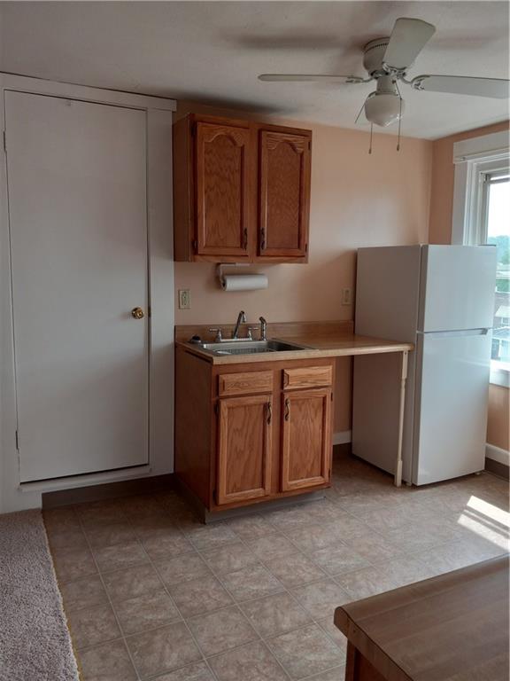 808 18th Street Ambridge, PA 15003 - Photo 35 of 49 a kitchen with stainless steel appliances a sink and a refrigerator
