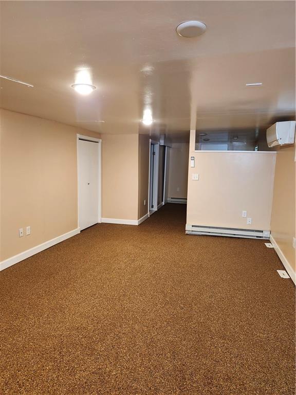 808 18th Street Ambridge, PA 15003 - Photo 37 of 49 an empty room with wooden floor and windows