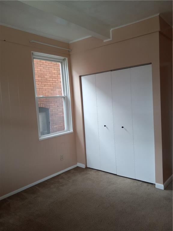 808 18th Street Ambridge, PA 15003 - Photo 6 of 49 a view of an empty room with a window