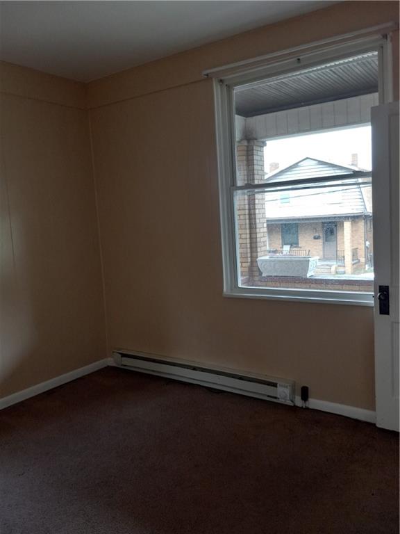 808 18th Street Ambridge, PA 15003 - Photo 7 of 49 a view of a small space with wooden floor and a window