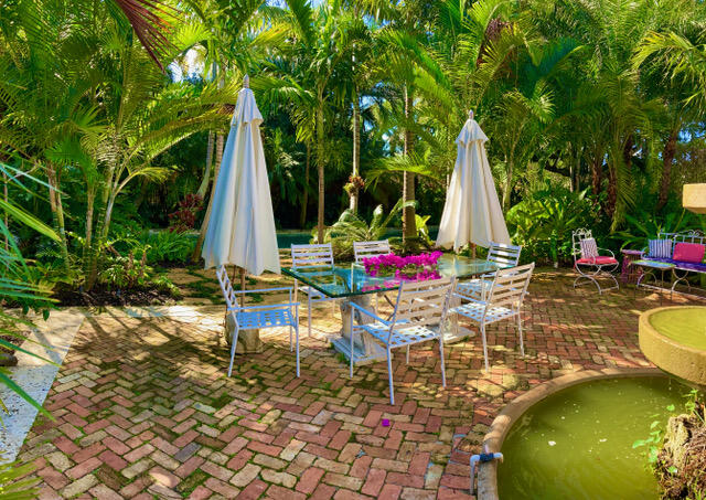 3130 Vincent Road West Palm Beach, FL 33405 - Photo 56 of 85 3130 Dining Pool Fountain