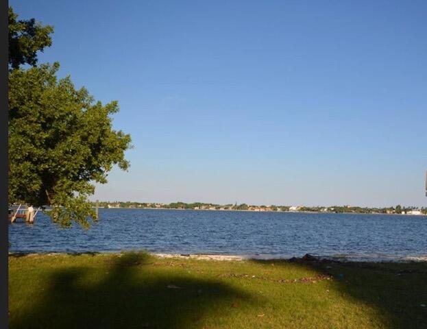 3130 Vincent Road West Palm Beach, FL 33405 - Photo 79 of 85 3130 Nearby Water View and Sidewalk