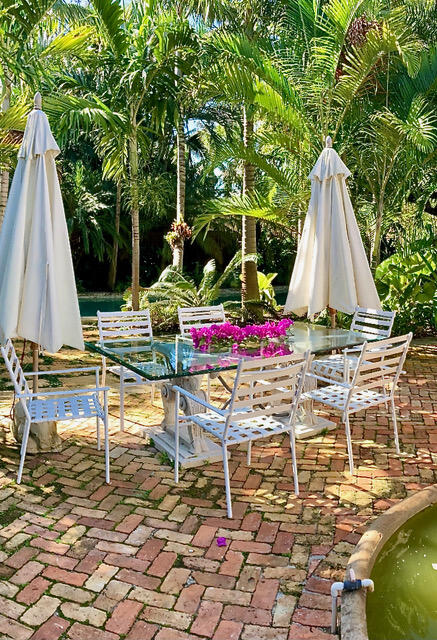 3130 Vincent Road West Palm Beach, FL 33405 - Photo 84 of 85 3130 Dining Pool Area
