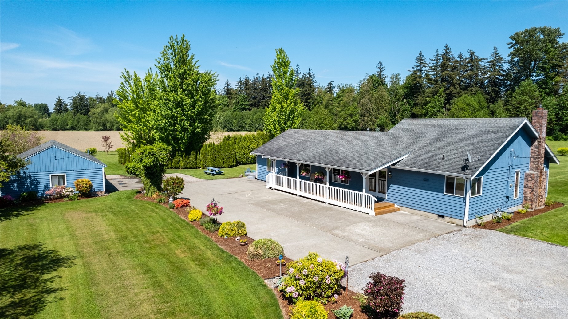 3304 South Pass Road Everson, WA 98247 - Photo 1 of 40 a house view with a garden space